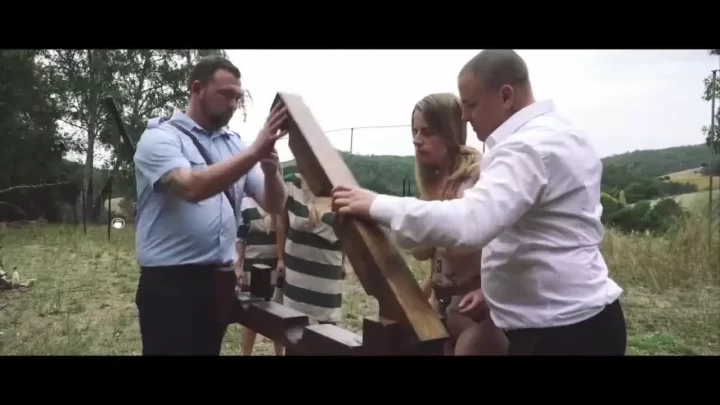 Blonde woman gets restrained outdoors