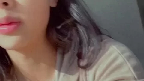 Asian Girl with Long Dark Hair Gets Up Close