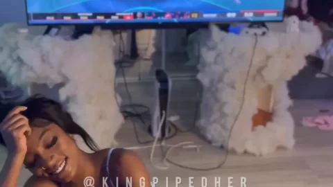 African American couple play video games, get intimate