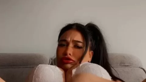 Asian girl self-pleasure on couch