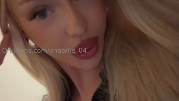 Blonde girl takes selfie while getting intimate