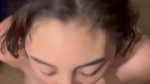 Black Haired Girl Gives White Guy a Blowjob